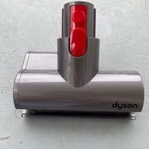 Dyson Gray and Red Vacuum Attachment